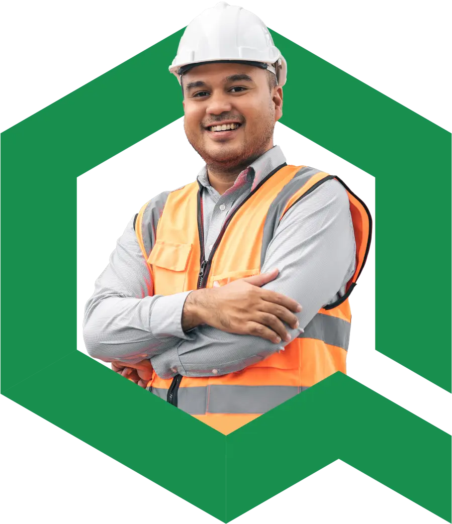 Man in high visibility vest and construction hat smiling at the camera in the green Qualis logo