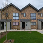 terraced housed with landscaping out front
