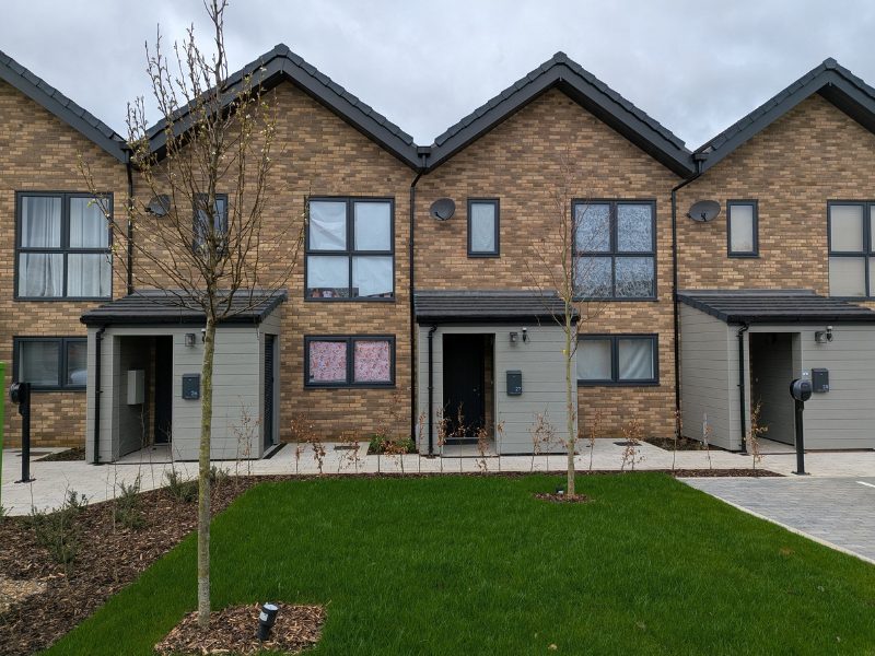 terraced housed with landscaping out front