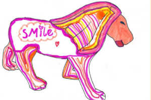 a coloured in lion, with pink and yellow main, a pink head and legs, and smile written on its body