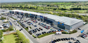 aerial view of epping forest retail park, showing a number of large shops